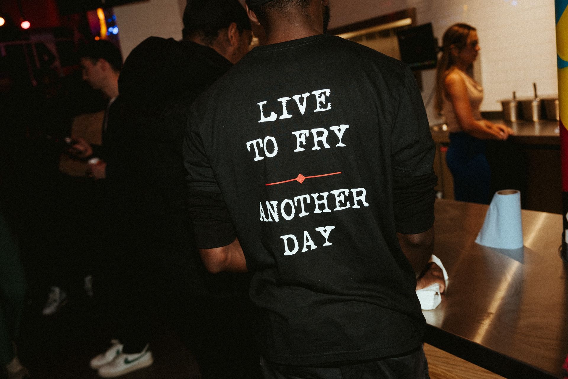 Staff t shirt with live to fry on back