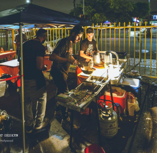 Original pop up photo of founders cooking